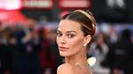 Unpacking the Look: Margot Robbie Stuns in 100 Carats of 'Nude Diamonds' and Sheer Corsetry