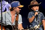 Watch: Video of Riley Green and Young Fan Singing 'Jesus Saves' at Georgia Show Takes over the Internet